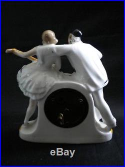 Pendulette Art déco et ses 2 vases Pierrot et Colombine, porcelaine Allemande
