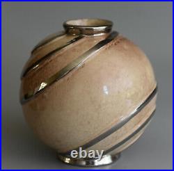 Vase boule Art DécoFaïence émaillée décor géométrique argentéFrance, vers 1930