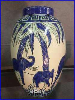 Vase en céramique émaillé style art Déco décors d'éléphants (signé et numéroté)