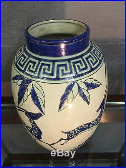 Vase en céramique émaillé style art déco a décor de gazelles (signé et numéroté)